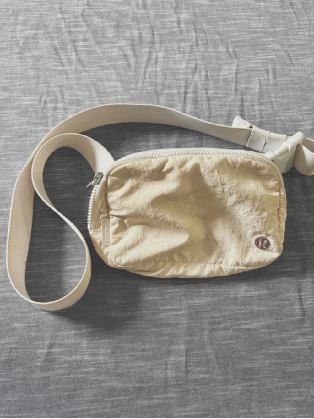 Lululemon Cream crossbody bag with Silver Logo Accent